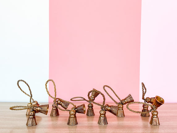 Set of Eight Brass Tassel Napkin Rings