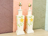 Pair of Yellow Floral Faux Bamboo Lamps