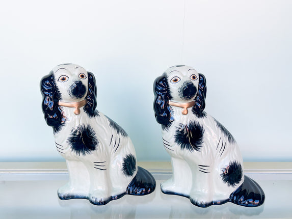Pair of Black and White Dog Figurines