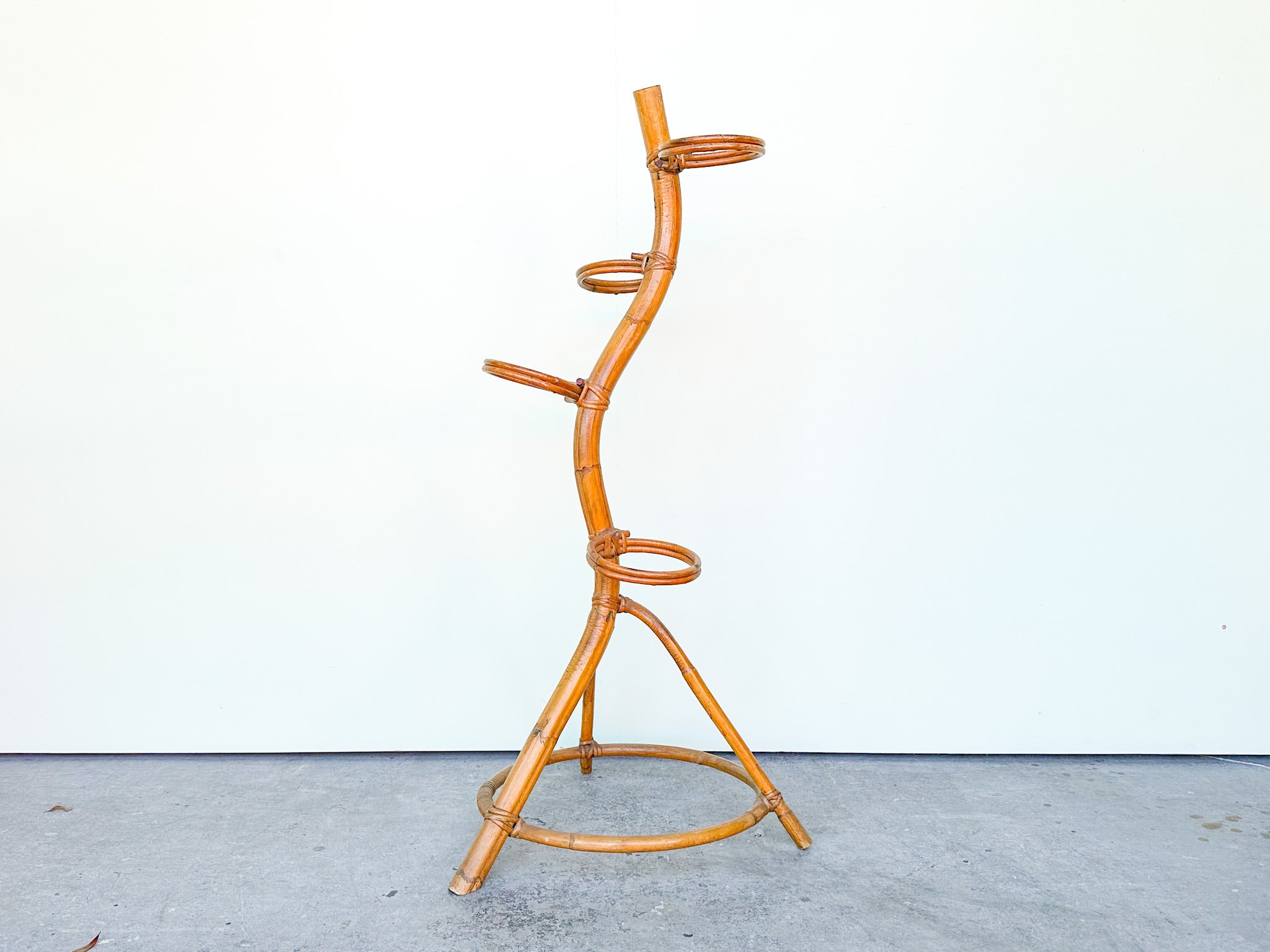 rattan snake plant holder Snake Style Rattan Plant Stand