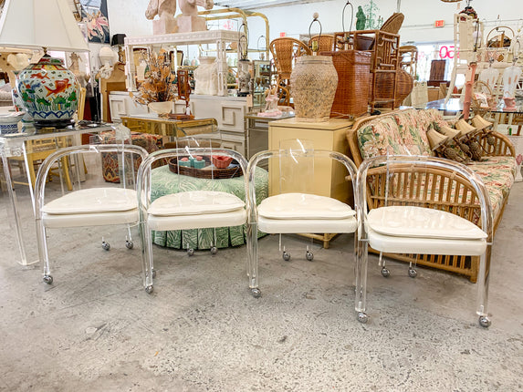 Set of Four Lucite Game Chairs on Casters