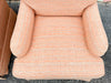 Pair of Peach Upholstered Swivel Chairs