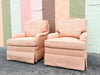 Pair of Peach Upholstered Swivel Chairs