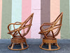 Pair of Old Florida Rattan Swivel Chairs and Ottoman