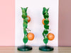 Pair of Orange Candlesticks