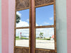 Pair of Island Chic Medallion Mirrors
