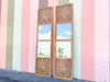 Pair of Island Chic Medallion Mirrors