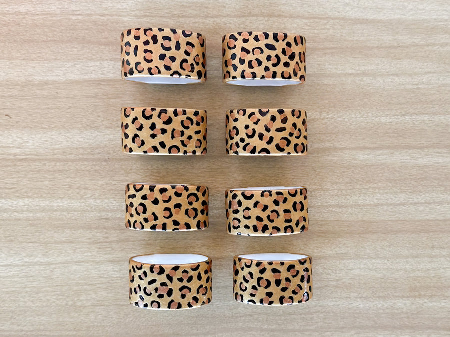 Set of Eight Hand Painted Cheetah Napkin Rings and Knife Rests