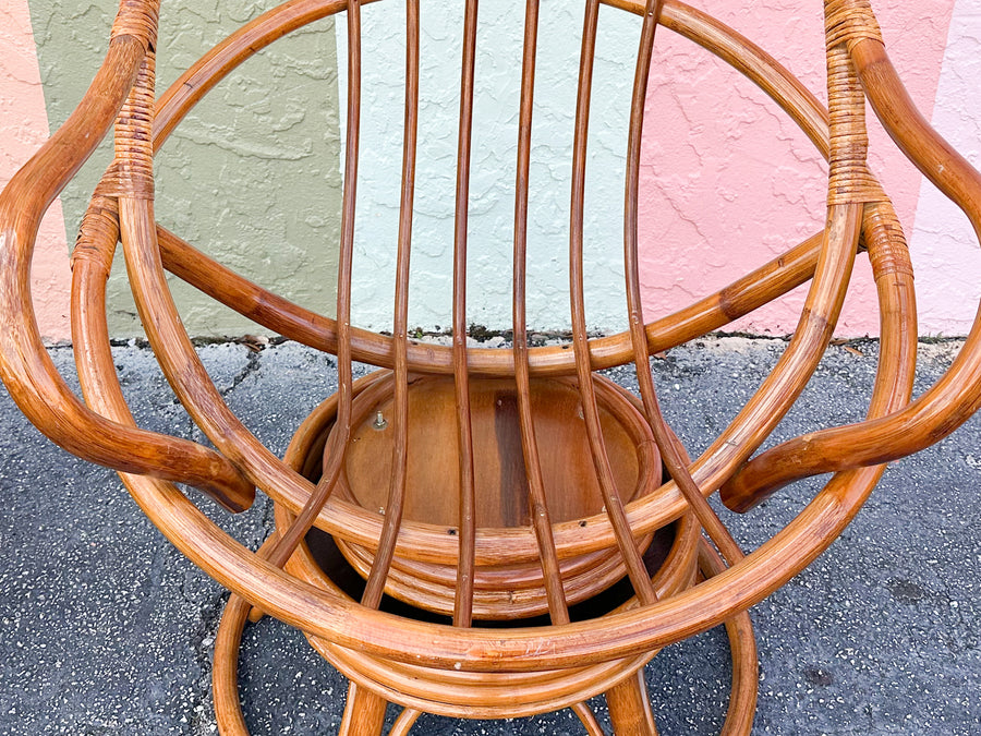 Pair of Old Florida Rattan Swivel Chairs and Ottoman