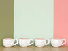 Set of Eight Shell Tea Cups and Saucers