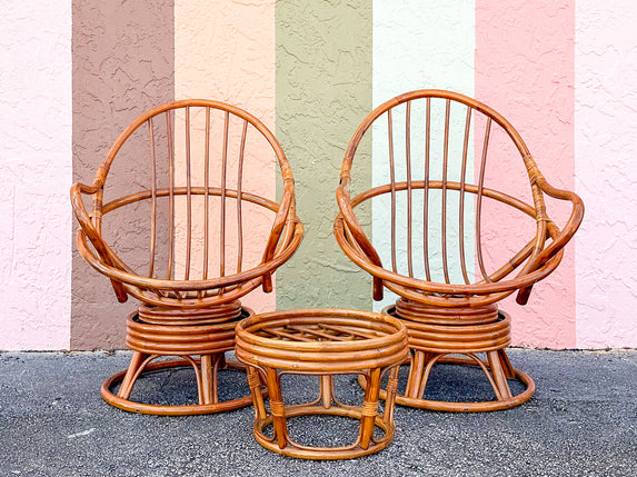 Pair of Old Florida Rattan Swivel Chairs and Ottoman