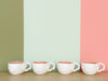 Set of Eight Shell Tea Cups and Saucers