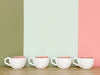 Set of Eight Shell Tea Cups and Saucers