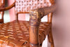 Pair of Island Chic Leather and Rattan Arm Chairs