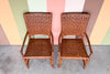 Pair of Island Chic Leather and Rattan Arm Chairs