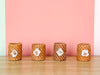 Set of Four Shell Flower and Rattan Napkin Rings