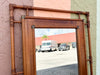 Handsome Rattan Mirror with Brass Detail