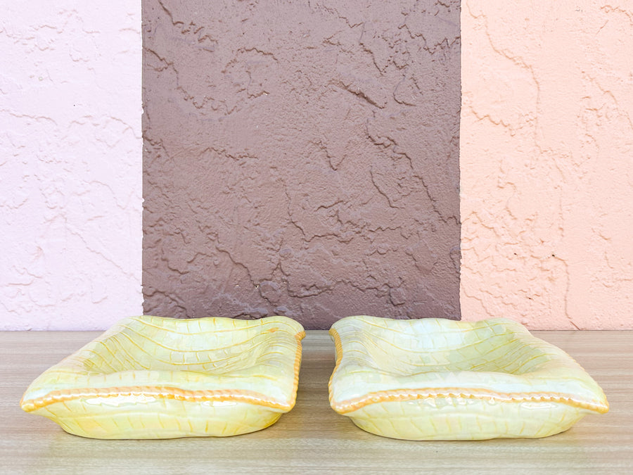 Stack of Pink and Yellow Ceramic Pillows