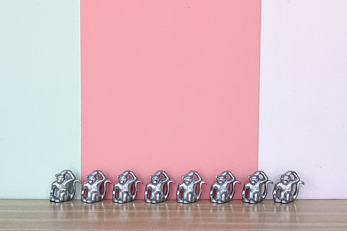 Set of Eight Pewter Monkey Placecard Holders