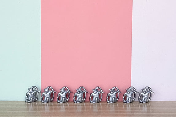 Set of Eight Pewter Monkey Placecard Holders