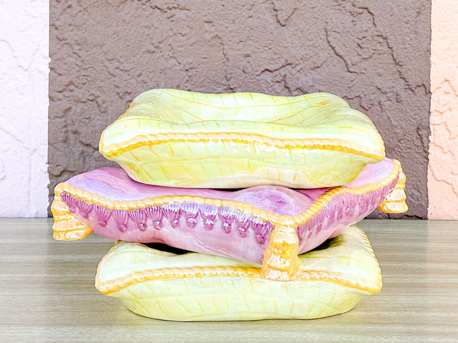 Stack of Pink and Yellow Ceramic Pillows