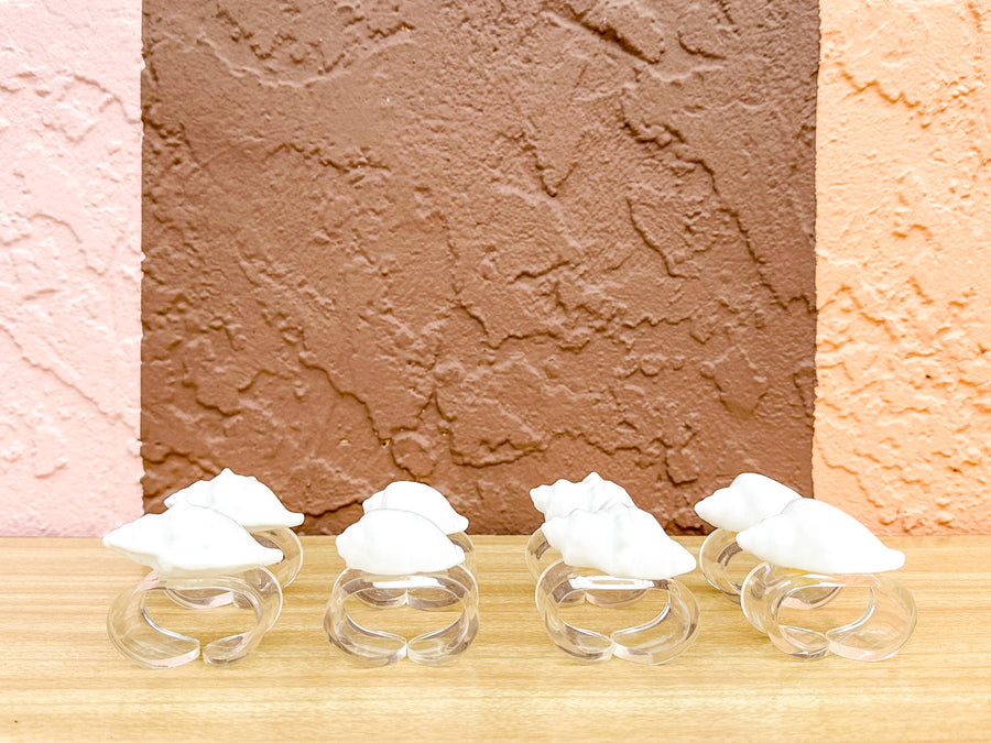 Set of Eight Shell and Lucite Napkin Rings