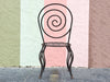 Set of Four Whimsical Circle Back Wrought Iron Chairs