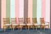 Set of Six Old Florida Rattan Dining Chairs