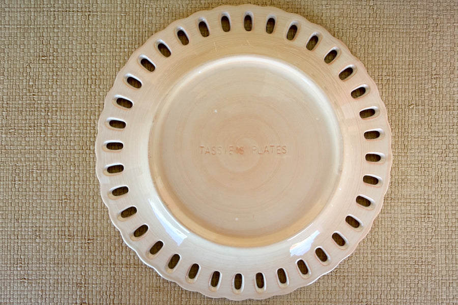Set of Sixteen Peachy Pierced Salad Plates