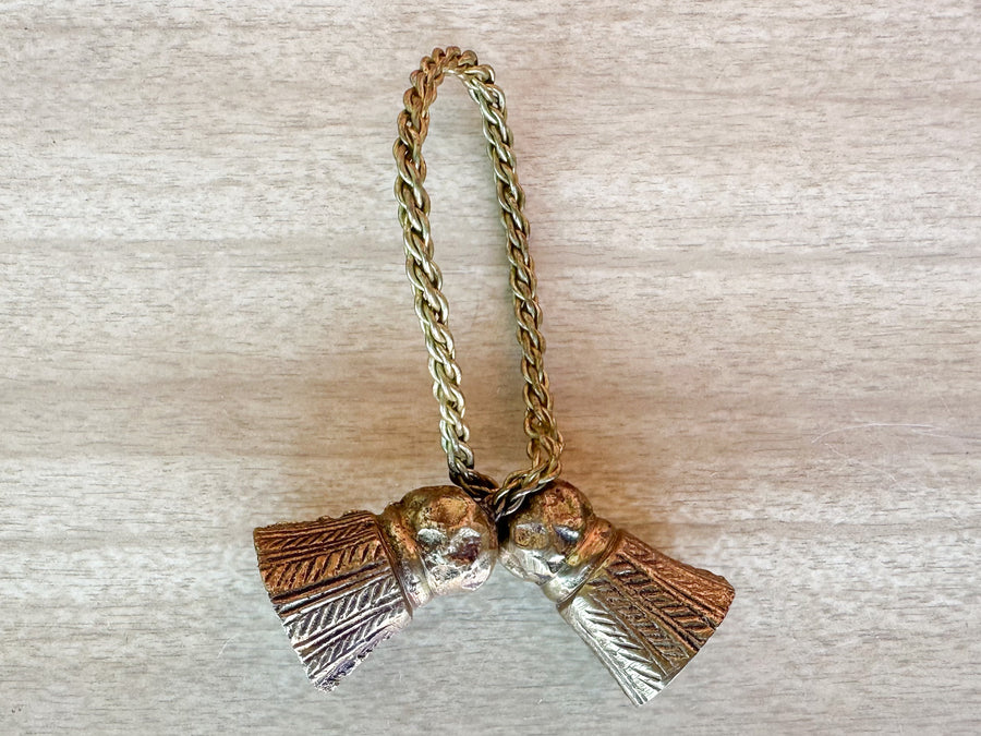 Set of Eight Brass Tassel Napkin Rings