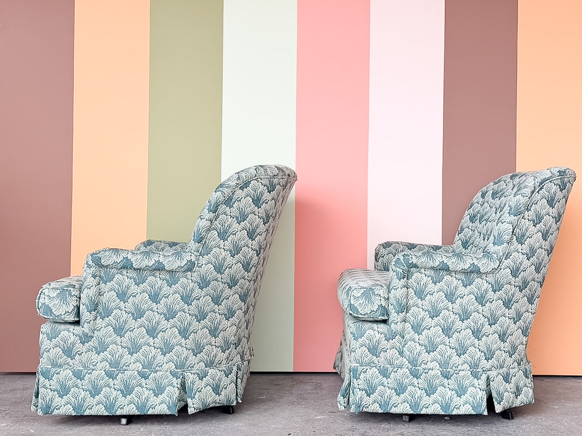 Pair of Shell Motif Upholstered Swivel Chairs