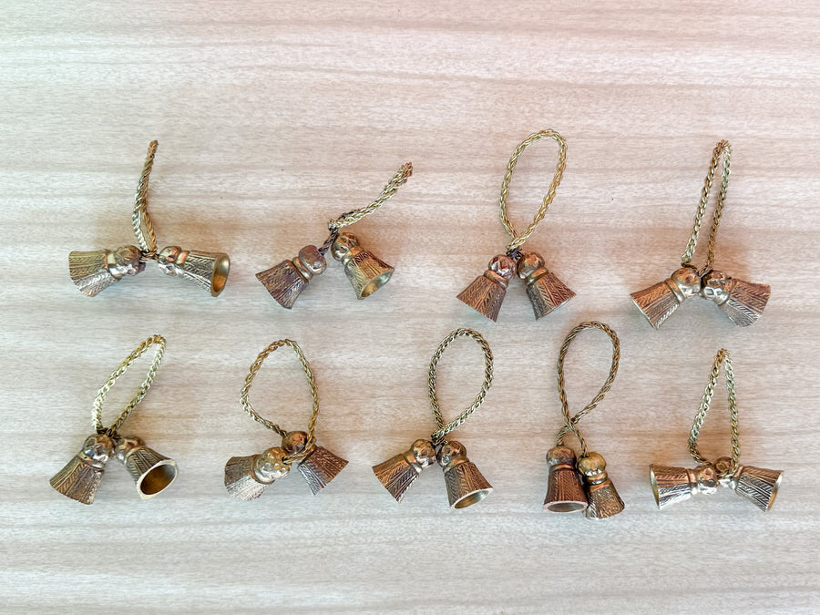 Set of Eight Brass Tassel Napkin Rings