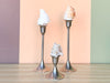 Set of Seven Pewter Shell Candlesticks