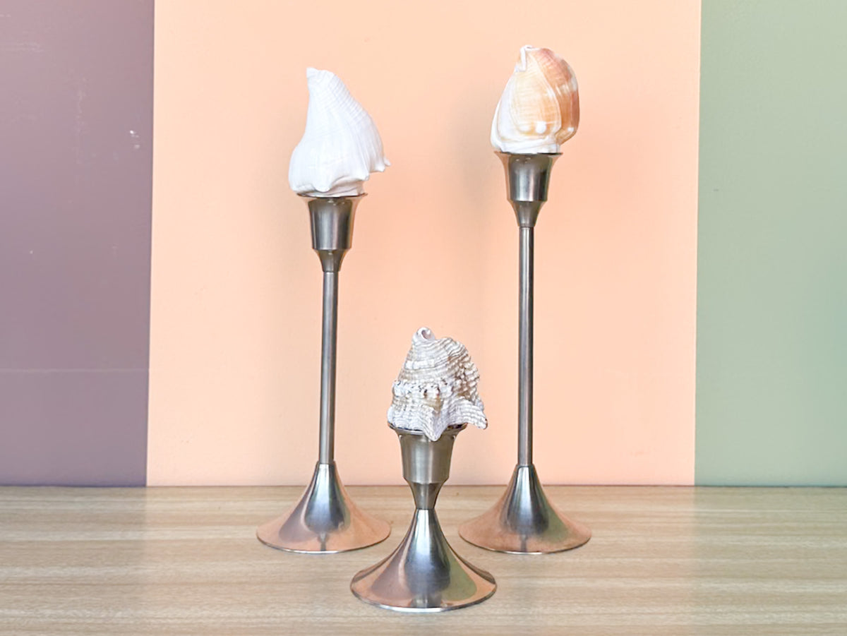 Set of Seven Pewter Shell Candlesticks