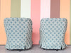 Pair of Shell Motif Upholstered Swivel Chairs