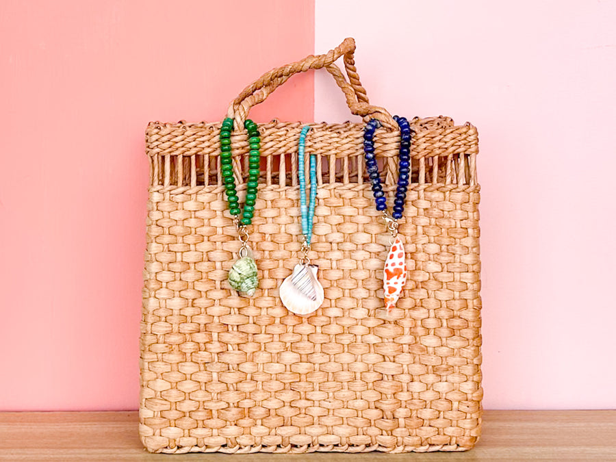 Palm Beach Regency's Lapis Gemstone and Shell Bag Charm