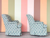 Pair of Shell Motif Upholstered Swivel Chairs