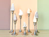 Set of Seven Pewter Shell Candlesticks
