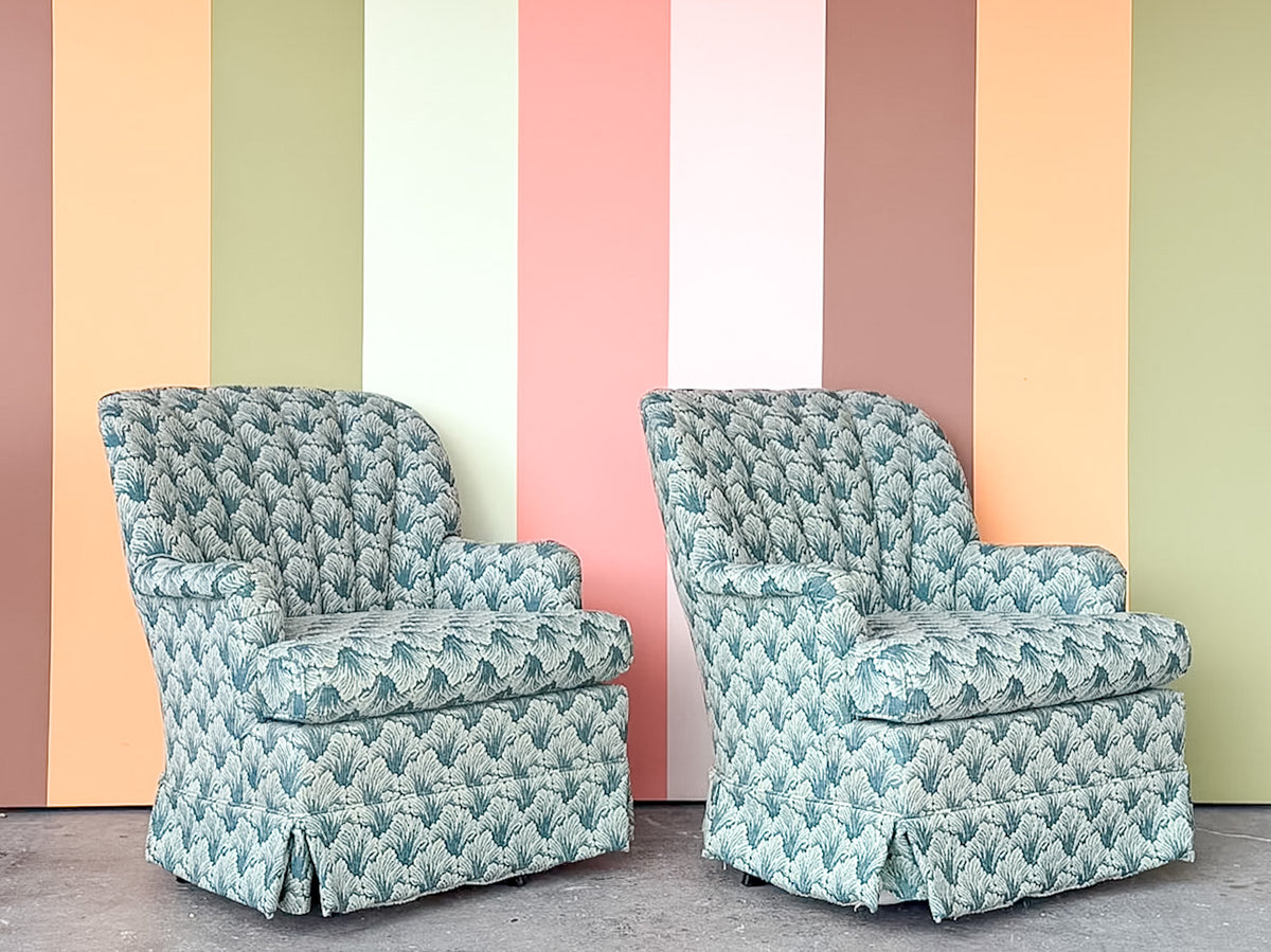 Pair of Shell Motif Upholstered Swivel Chairs