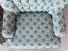 Pair of Shell Motif Upholstered Swivel Chairs