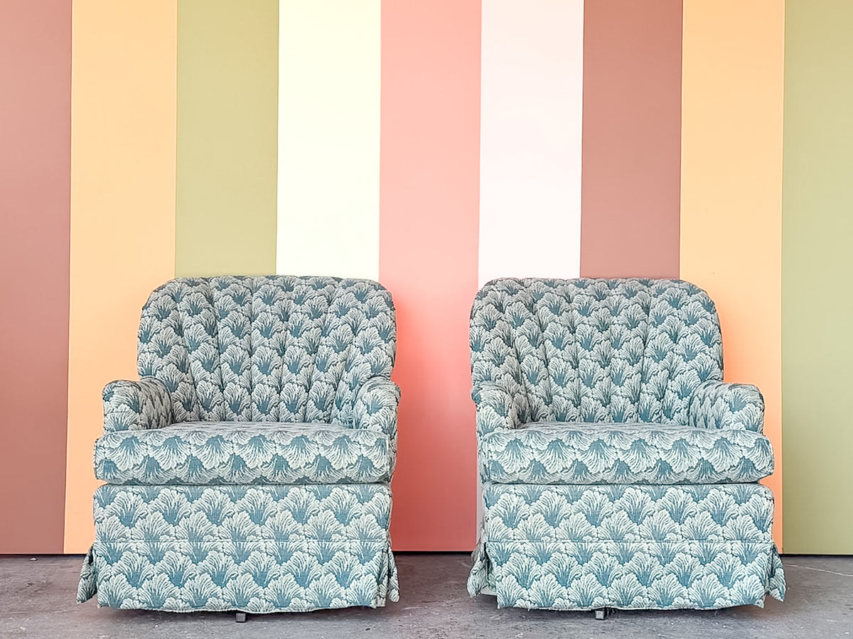 Pair of Shell Motif Upholstered Swivel Chairs