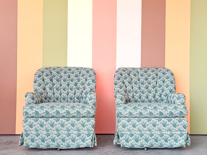 Pair of Shell Motif Upholstered Swivel Chairs