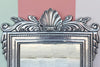Pressed Metal Shell Motif Mirror