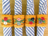 Set of Twelve Raffia Flower Napkin Rings