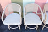 Set of Six Ficks Reed Rattan and Cane Barrel Chairs on Casters