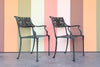 Set of Four Shell Motif Cast Iron Chairs