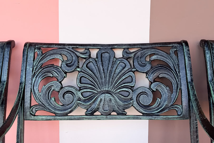 Set of Four Shell Motif Cast Iron Chairs