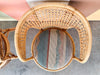 Pair of Rattan and Cane Barrel Chairs