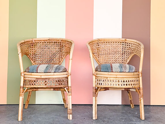 Pair of Rattan and Cane Barrel Chairs