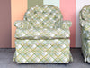Pair of Pink and Green Plaid Upholstered Swivel Chairs